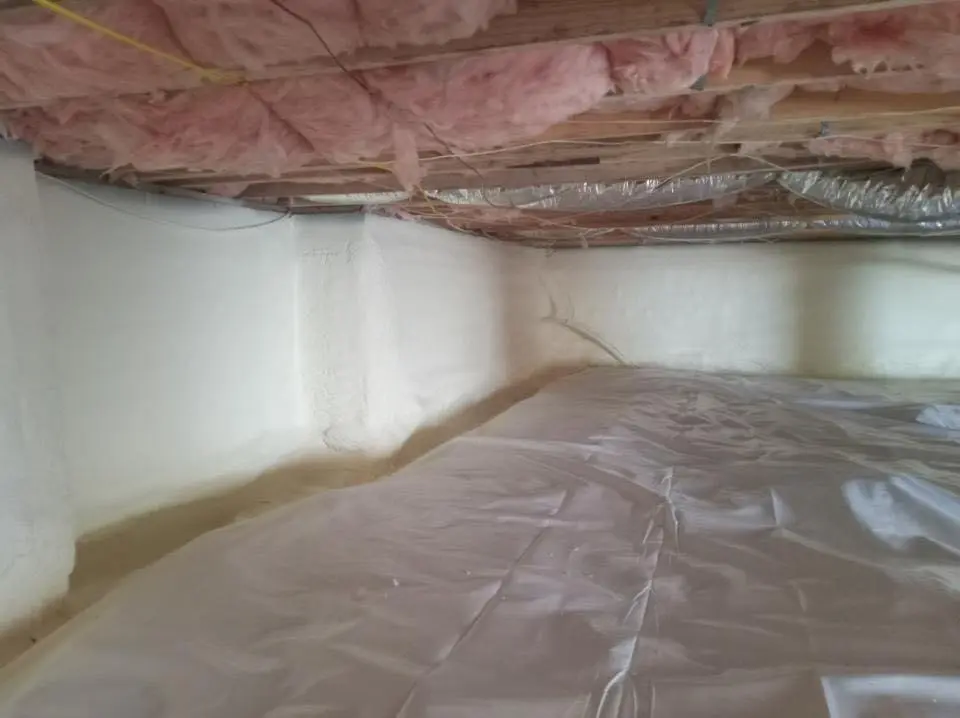 Crawl space encapsulation with closed-cell spray foam for Commercial Roof Restoration in Kenai